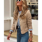 Beige tweed cropped jacket with gold-tone buttons, collarless front, patch pockets