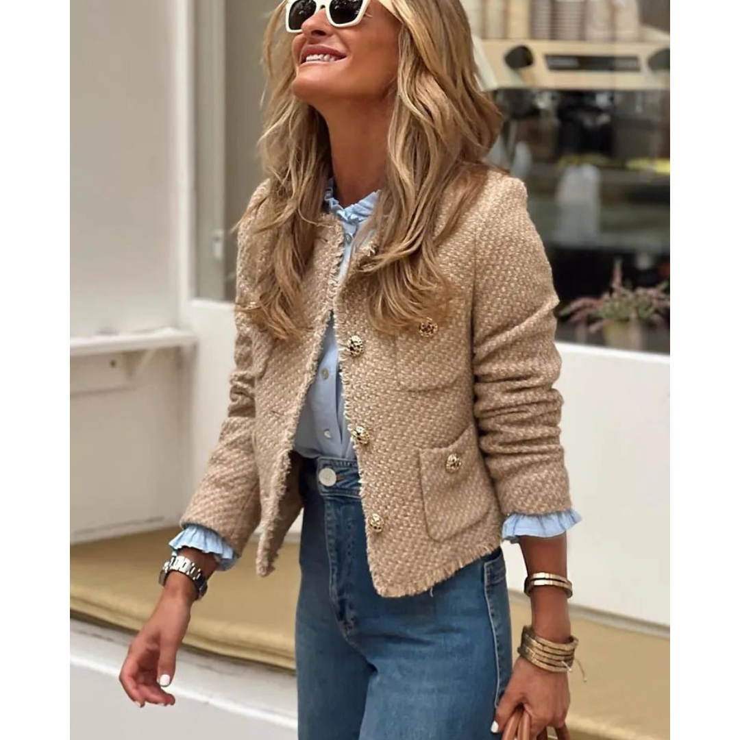 Beige tweed cropped jacket with gold-tone buttons, collarless front, patch pockets