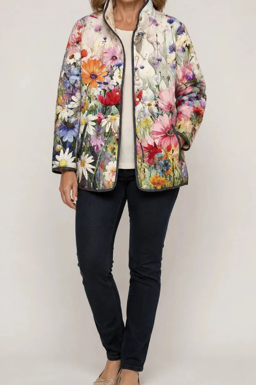 Wearbella cream quilted jacket with vivid watercolor wildflower print and snap front.