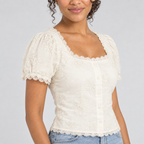 Cream lace puff sleeve detail with scalloped cuff and floral embroidery