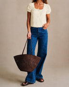 Cream short-sleeve lace tee with square neckline, puff sleeves, scalloped hem