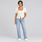 Cream lace puff-sleeve tee full-length view with straight-leg jeans and white sneakers