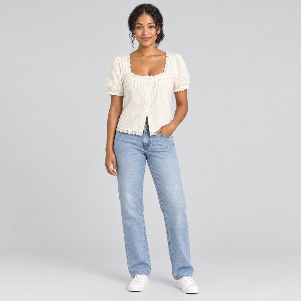 Cream lace puff-sleeve tee full-length view with straight-leg jeans and white sneakers