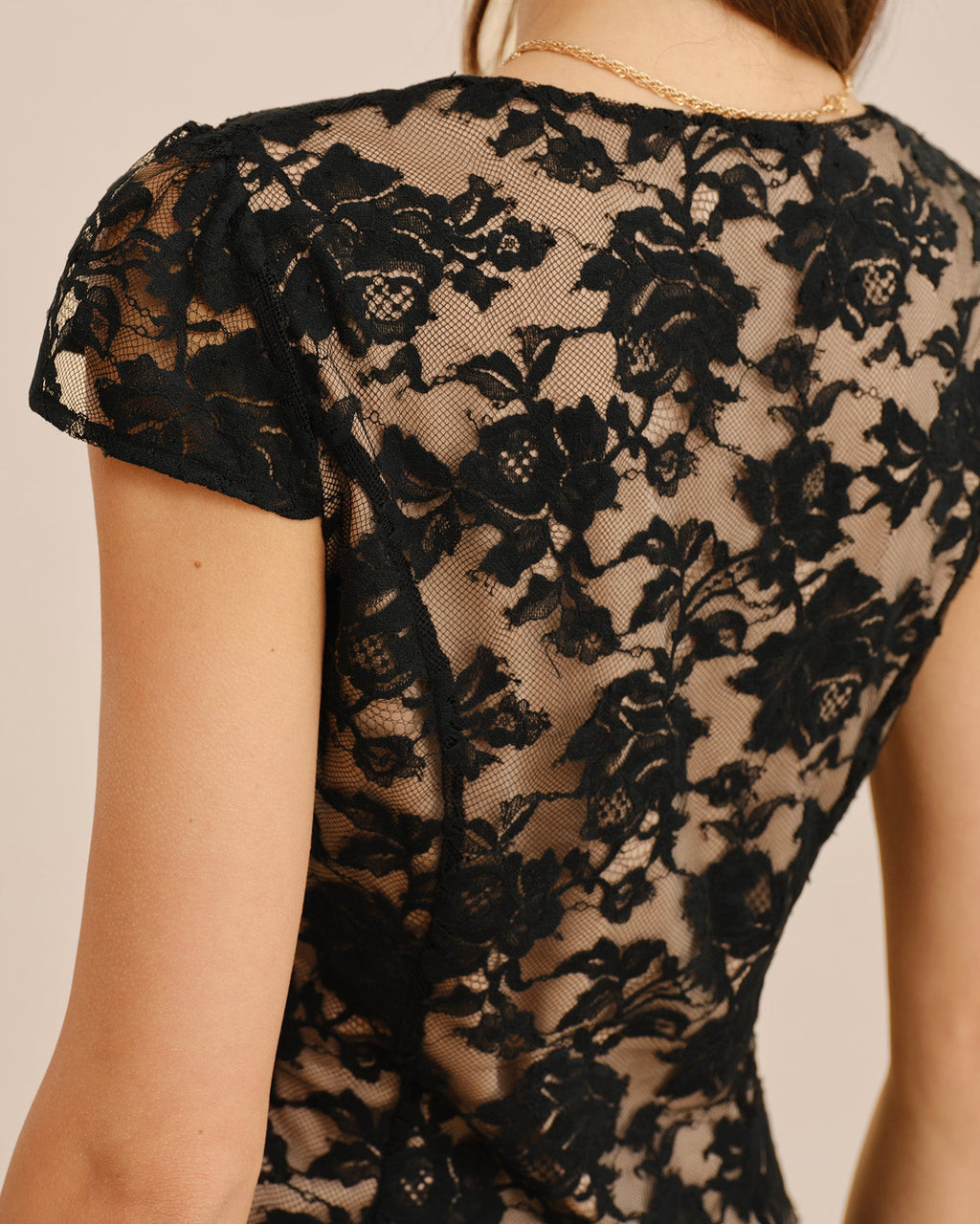 Black floral lace blouse back with cap sleeves and fitted bodice