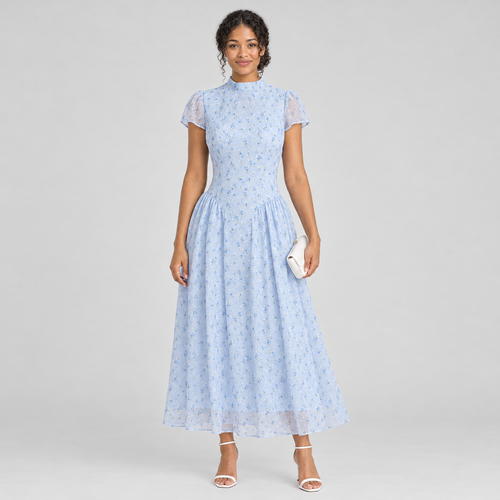 Blue floral chiffon maxi dress on model with mock neck and white clutch