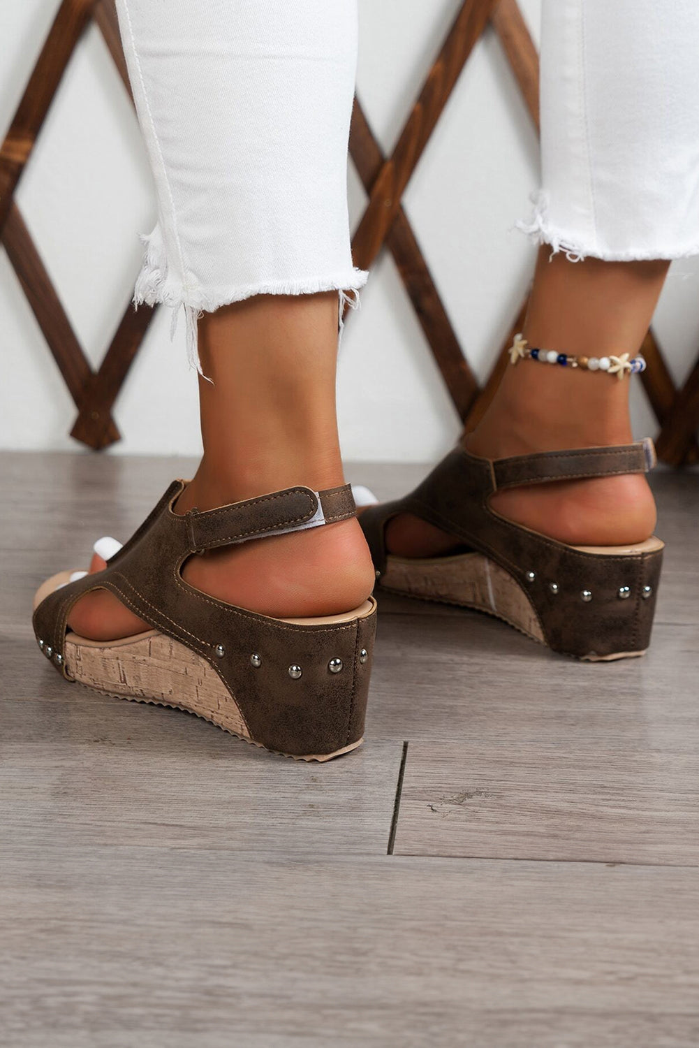 Chestnut wedge sandals with ankle strap, cutout upper, small studs on sides
