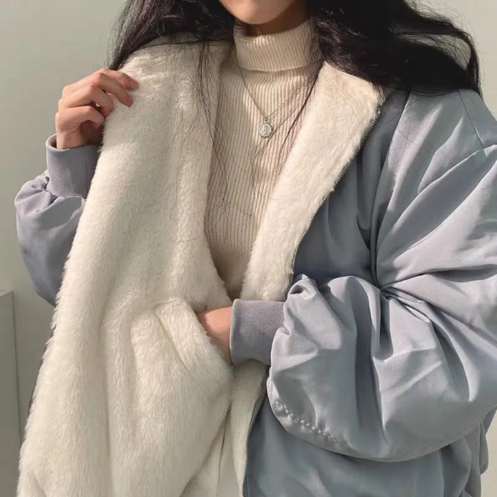 Women’s winter coat in light gray with cream faux-fur lining and zip-front