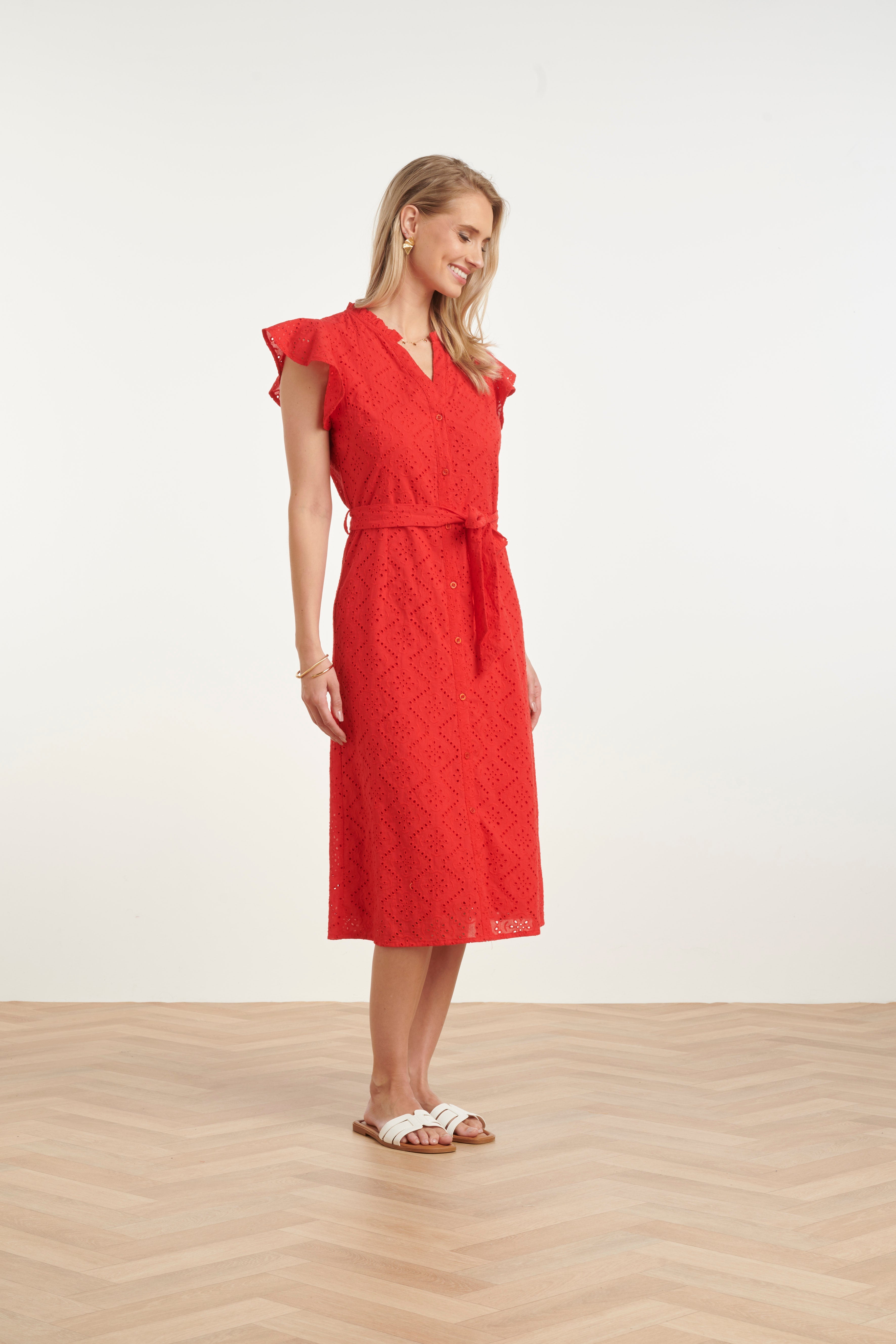 Red women's midi dress side profile, flutter sleeves and geometric embroidery, tie belt