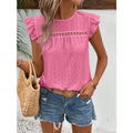 Women's eyelet cap-sleeve blouse in pink with ruffled sleeves and round neckline