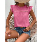 Women's eyelet cap-sleeve blouse in pink with flutter ruffled shoulders and eyelet detail