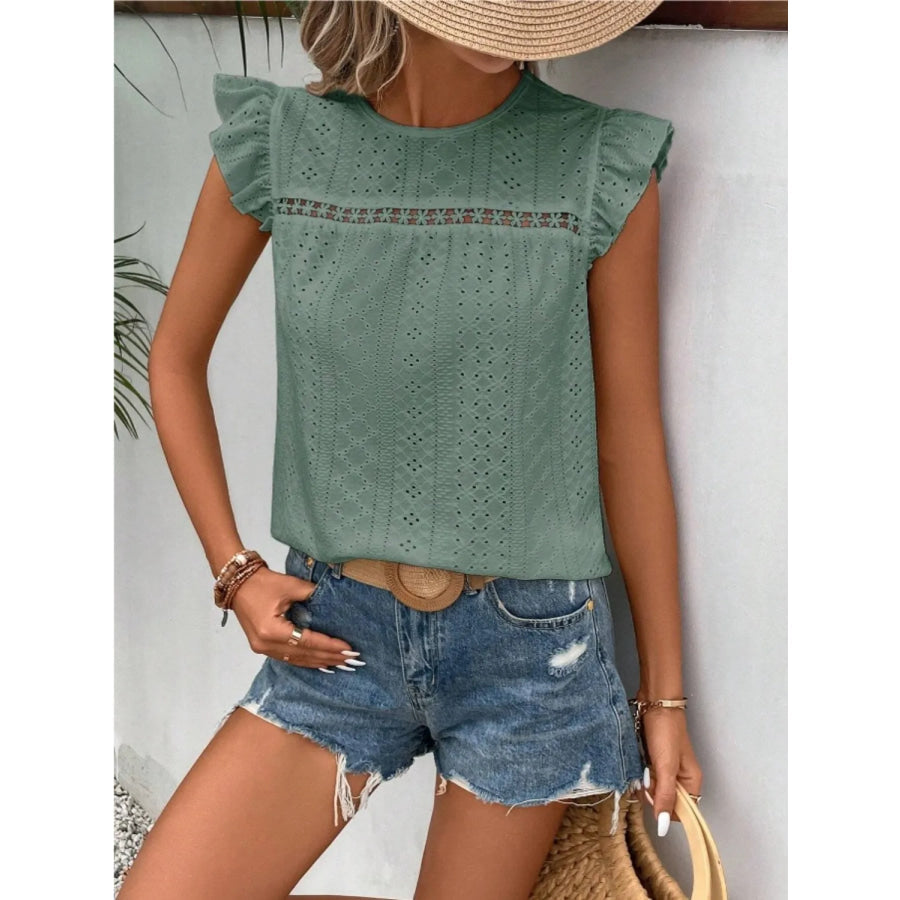 Women's eyelet cap-sleeve blouse in sage green with ruffled shoulders and eyelet design