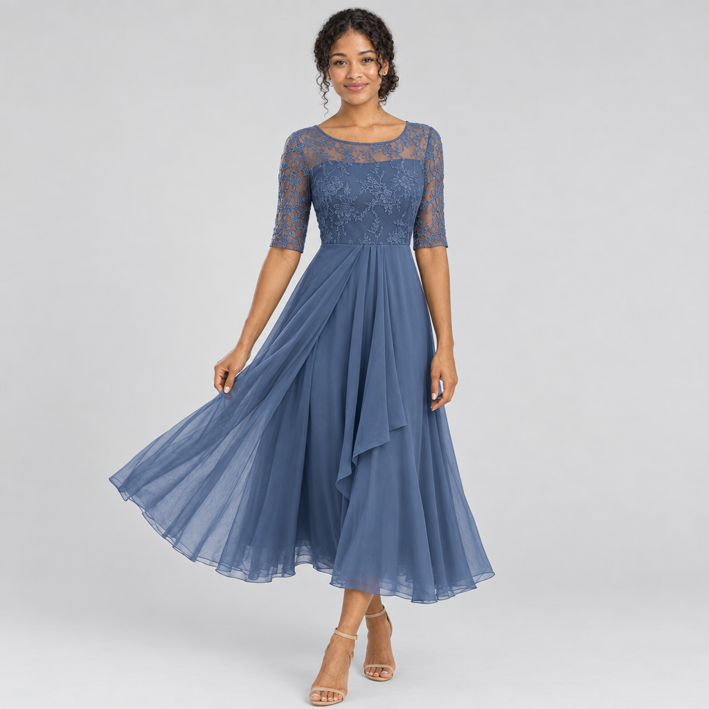 Dusty blue lace bodice midi dress with flowing chiffon skirt in motion