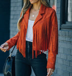 Orange cropped faux suede fringe jacket with notched collar and sleeve tassel fringe