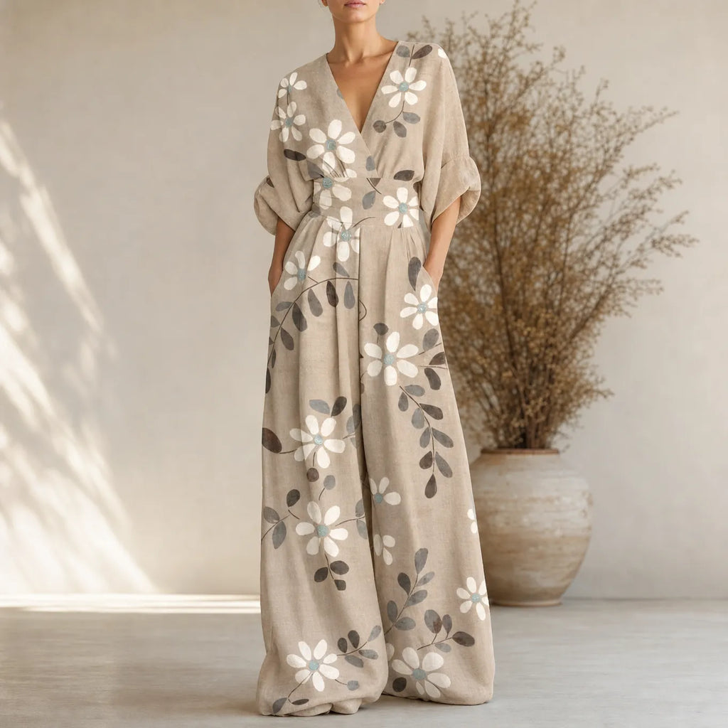 Women’s cream floral V-neck wide-leg jumpsuit with cinched waist and pockets