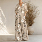Women’s cream floral V-neck wide-leg jumpsuit with cinched waist and pockets