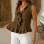 Dark brown sleeveless ruffle V-neck peplum blouse with tie bow and button details
