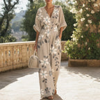 Women’s cream floral V-neck wide-leg jumpsuit with cinched waist and pockets