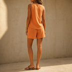 Orange linen-look 2-piece set with button-front sleeveless top and relaxed shorts (back)