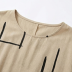 Beige crew-neck shift dress neckline with black abstract line print