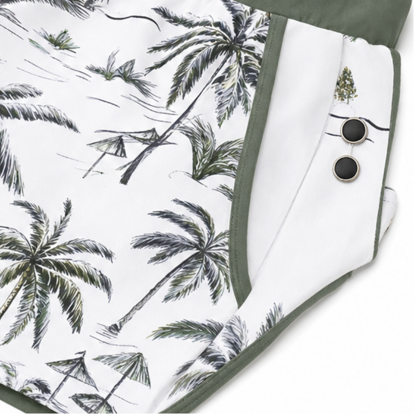 Palm-print full-coverage swim shorts with green side panels and adjustable buttons