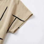 Beige shift dress sleeve detail with black abstract line print