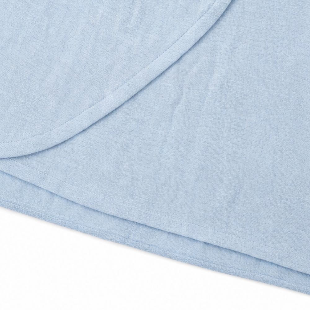 Powder blue midi dress fabric with soft drape at the hem