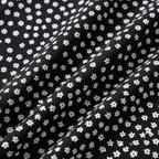 Black fabric with white tiny flower print for smocked wide-leg ruffle trousers