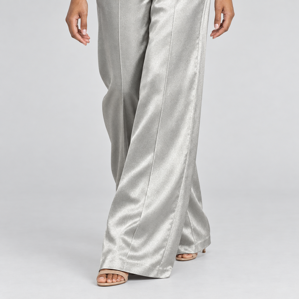 Metallic satin wide-leg trouser hem detail with pressed front seam