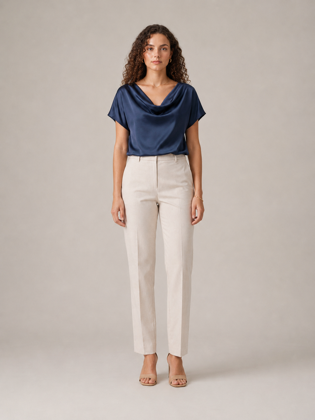 Navy draped-neck blouse with short sleeves and cowl collar detail