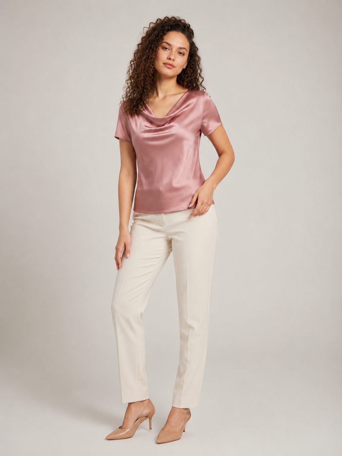 Pink draped-neck blouse with short sleeves and soft cowl neckline