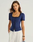 Navy square-neck blouse with scalloped lace trim, short sleeves, and button front