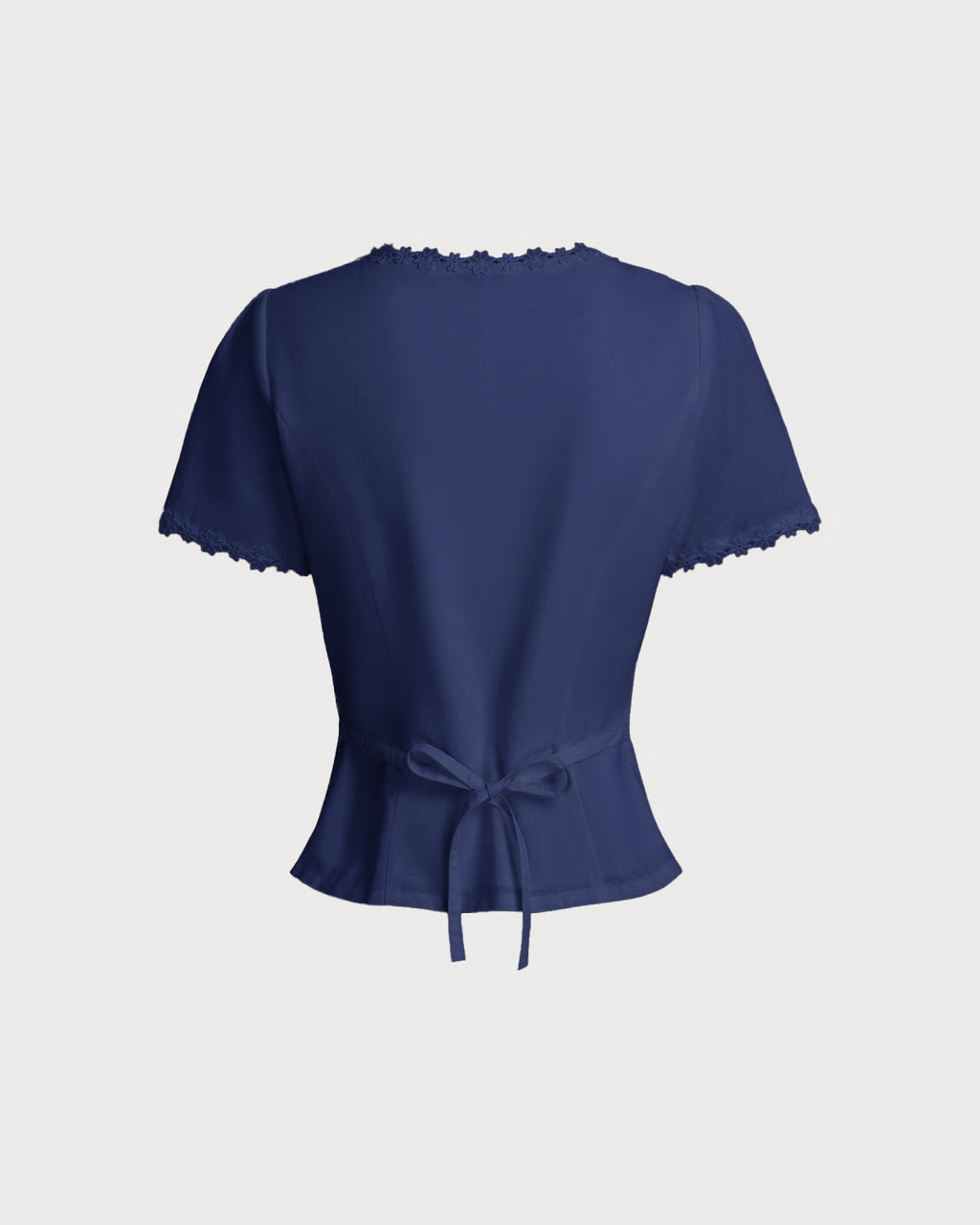 Navy blouse back with scalloped lace trim and waist tie