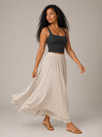 Black slim-fit sleeveless tank top with V neckline and twisted front detail