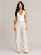 White fitted sleeveless V-neck top with contoured bust and waist seam