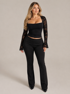 Black square-neck lace top with flared long sleeves, fitted bodice