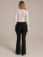 White square-neck lace top with flared long sleeves, back view