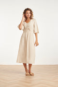 Sand midi dress with lace-up V-neck, elastic waist, and three-quarter sleeves