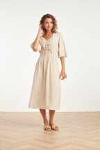 Sand midi dress with lace-up V-neck, elastic waist, and three-quarter sleeves