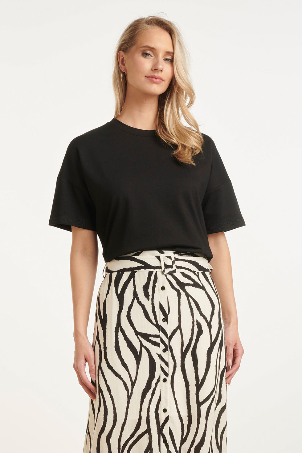 Black oversized short-sleeve T-shirt on model, crew neck