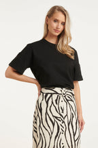 Black oversized crew-neck T-shirt close-up, short sleeves