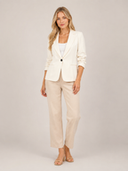 Cream one-button tailored women’s blazer with notched lapel and cuffed sleeves
