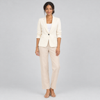 Cream one-button blazer on model with white top and beige trousers, front view