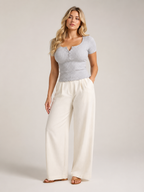 Gray ribbed fitted women's top with square neckline and front button placket, short sleeves
