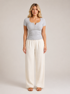 Gray ribbed fitted women's top with square neckline and front button placket, short sleeves