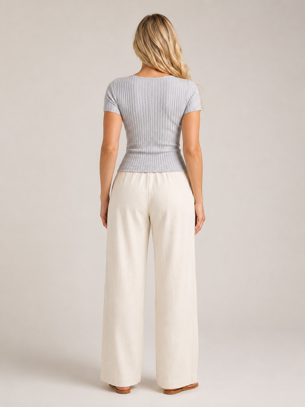 Gray ribbed fitted women's top shown from back with short sleeves
