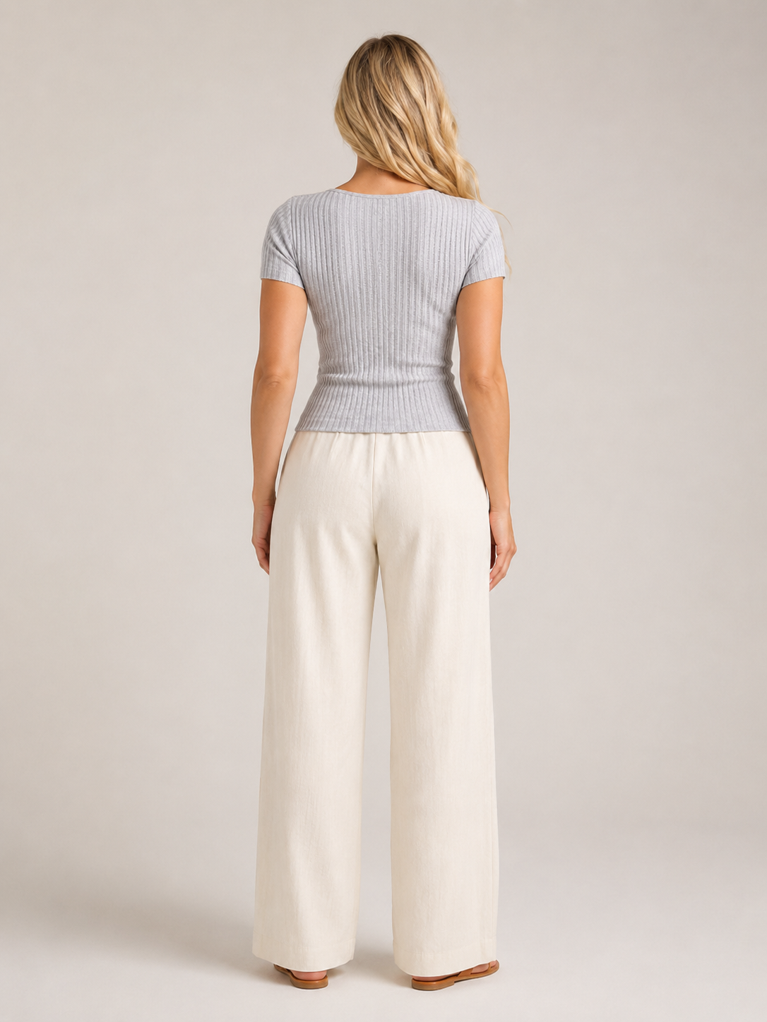 Gray ribbed fitted women's top shown from back with short sleeves
