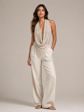 Sabria halter top in beige with waterfall neckline and draped open-back detail