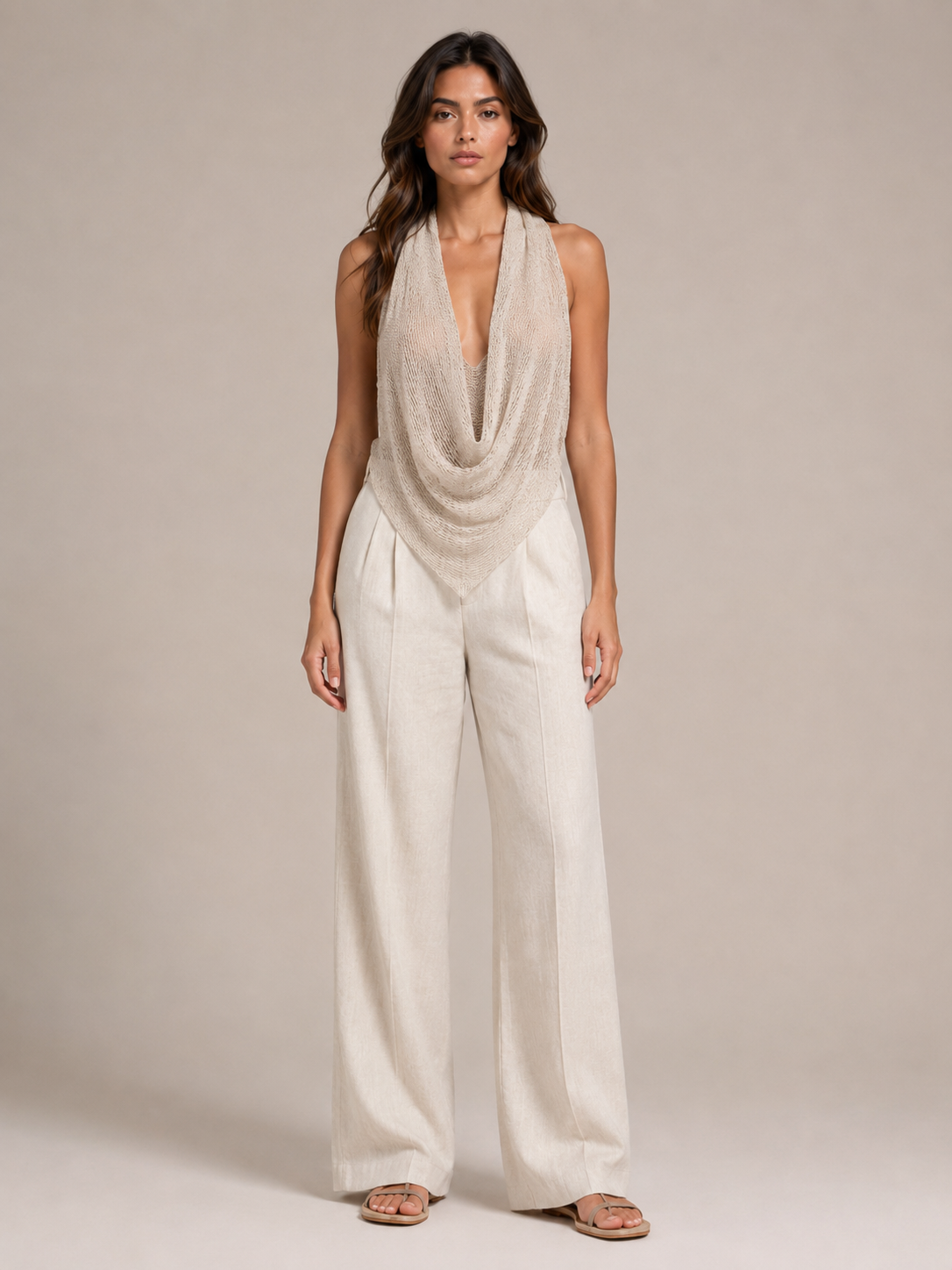 Sabria halter top in beige with cowl waterfall neckline and draped open-back design