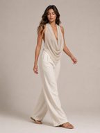 Sabria halter top in beige with waterfall neckline and draped open-back