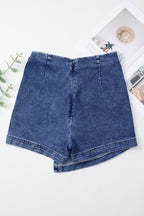 Blue acid-wash denim skort with front center seam and contoured waistband
